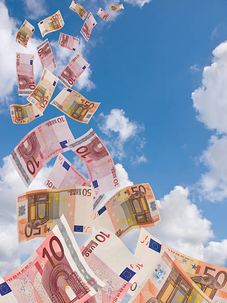 istock lot of flying away banknote on  a sky background 105765921