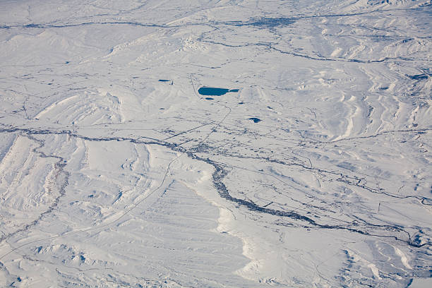 istock Arial view of snow covered terrain 105765995
