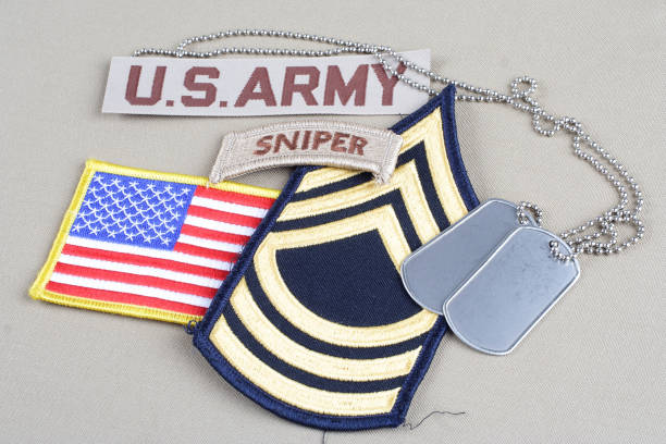 istock US ARMY Master Sergeant rank patch, sniper tab, flag patch and dog tag 1057660122