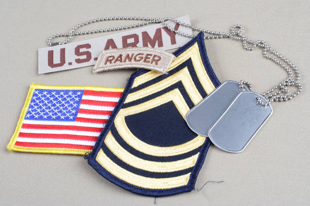 istock US ARMY Master Sergeant rank patch, ranger tab, flag patch and dog tag 1057660130