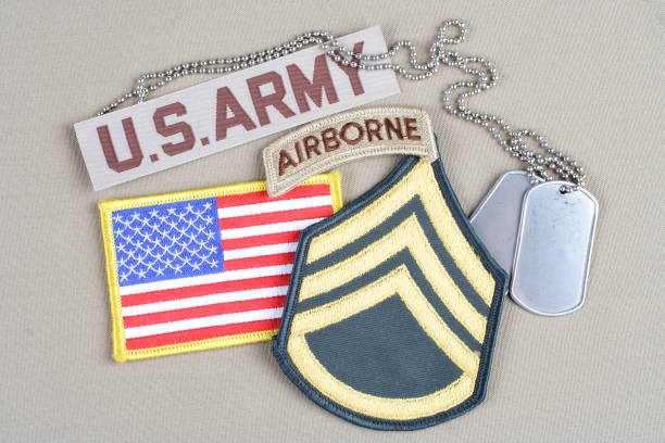 istock US ARMY Staff Sergeant rank patch, airborne tab, flag patch and dog tag 1057660400