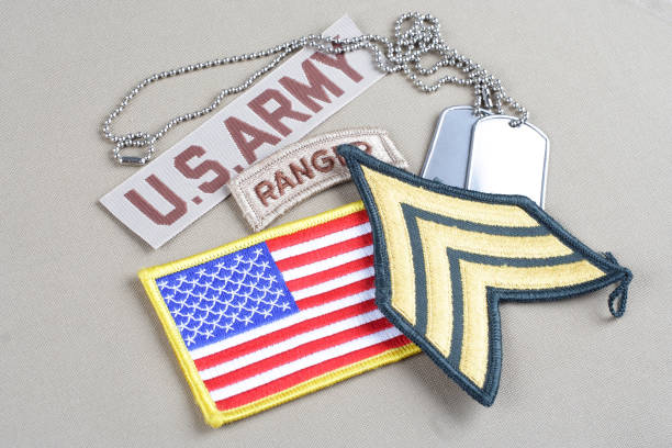 istock US ARMY Sergeant rank patch, ranger tab, flag patch and dog tag 1057660654