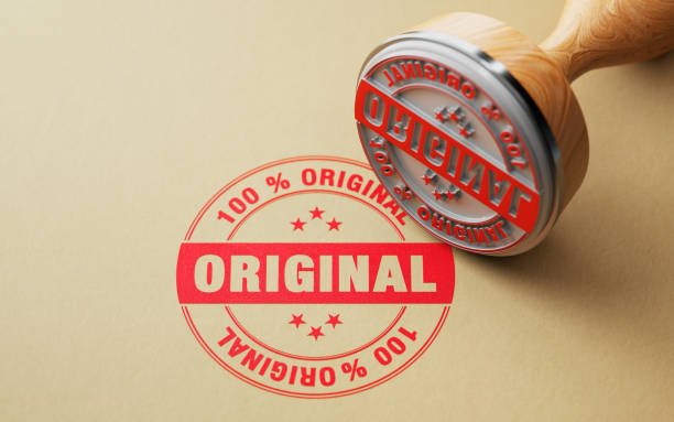 istock Wooden 100 % Original Stamp On Recycled Paper 1057660856