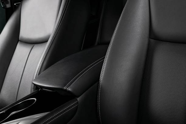 istock Car inside. Interior of a car. Comfortable leather seats. Perforated leather. Car interior details. Car detailing 1057662320