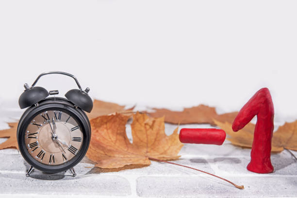 Daylight Saving Time. Wall Clock going to winter time. Autumn abstraction. Fall back time.