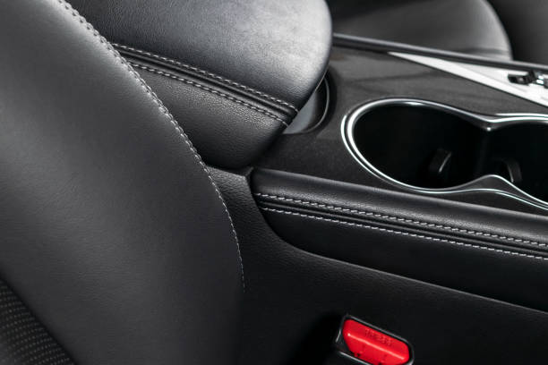 istock Car inside. Interior of a car. Comfortable leather seats. Perforated leather. Car interior details. Car detailing 1057662982