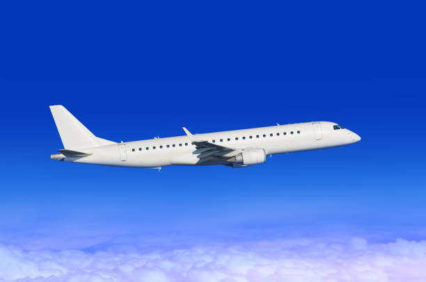 istock White aircraft in sky 1057663002