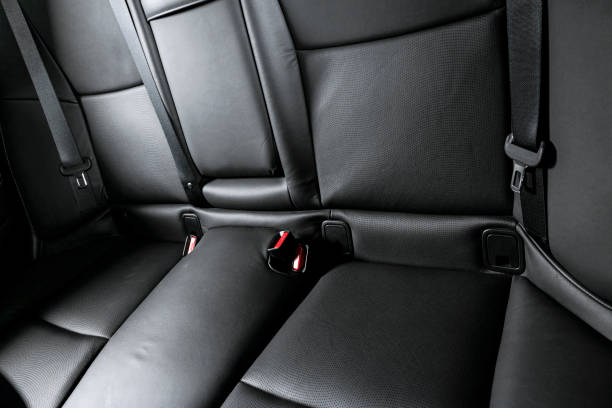 istock Car inside. Interior of a car. Comfortable leather seats. Perforated leather. Car interior details. Car detailing 1057663082