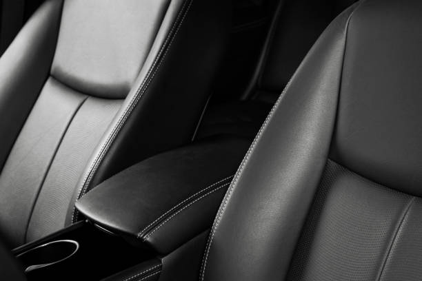istock Car inside. Interior of a car. Comfortable leather seats. Perforated leather. Car interior details. Car detailing 1057663118