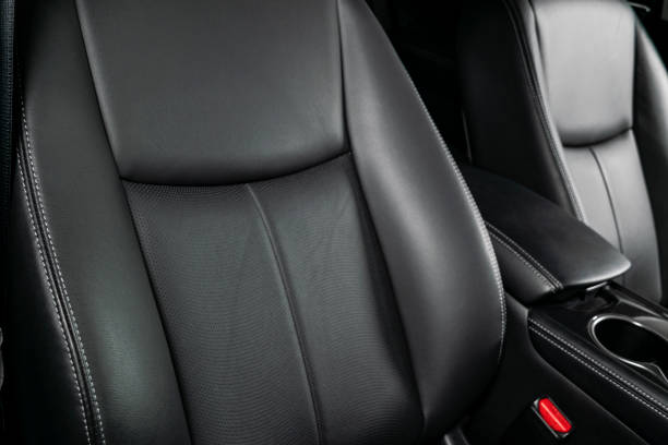 istock Car inside. Interior of a car. Comfortable leather seats. Perforated leather. Car interior details. Car detailing 1057663238