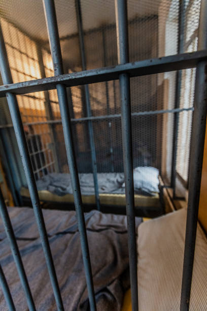 istock Glimpse at the interior of an old jail. 1057665960