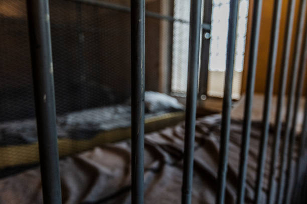 istock Glimpse at the interior of an old jail. 1057665974