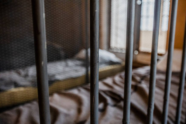 Glimpse at the interior of an old jail. stock photo