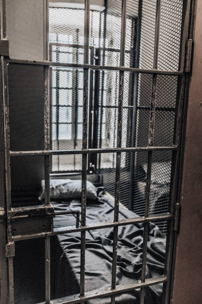 istock Glimpse at the interior of an old jail. 1057665994
