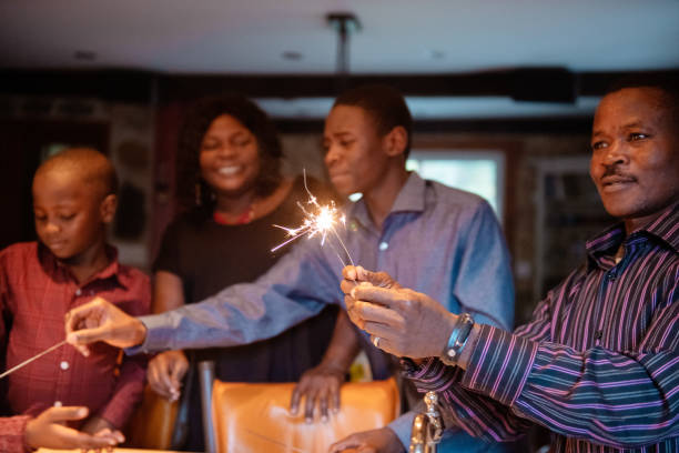 istock Thanksgiving dinner with American-African family preparing dinner 1057668064