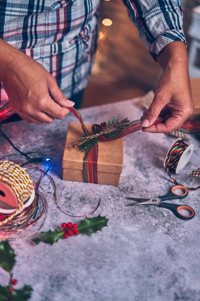 istock Wrapping and Decorating Christmas Presents 1057668500