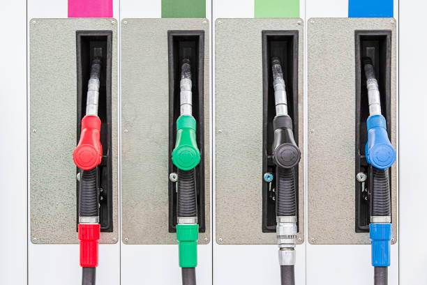 istock Gas station with four multi-colored handles 1057674654