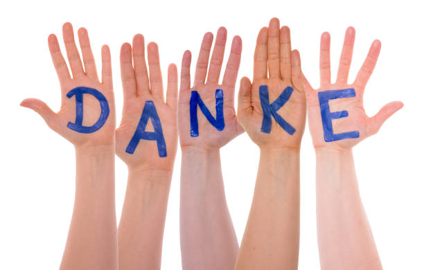 istock Many Hands Building Danke Means Thank You, Isolated 1057675354