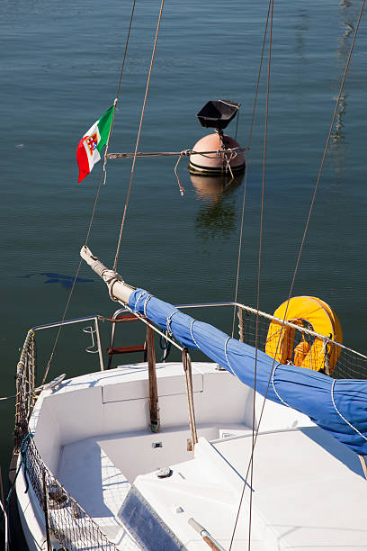 Sailing in Cabo San Lucas, point of union of the Pacific Ocean with the Sea of Cortés, Los Cabos, State of Baja California Sur, Mexico.
