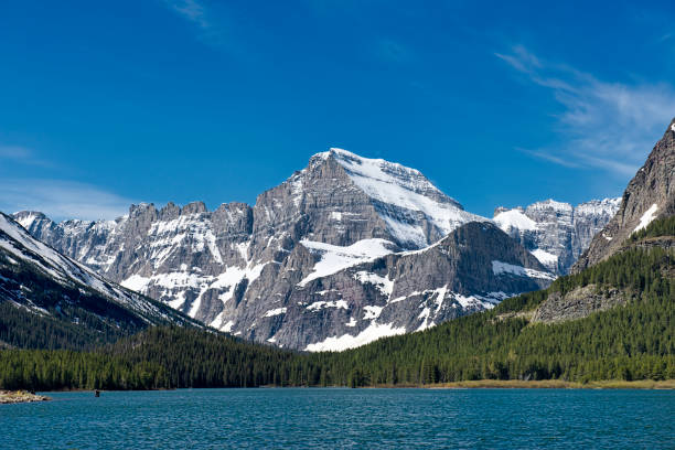 istock Snow Capped Mountain in Glacier National Park 1057685414