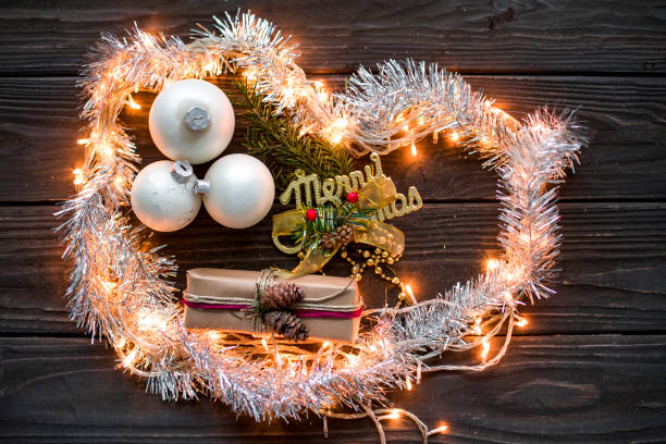 istock Christmas composition with gifts on black wooden board 1057686470