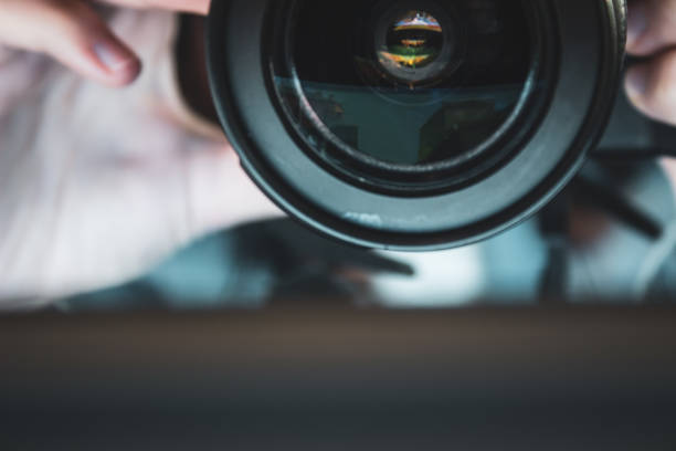 istock Camera lens close-up.photographer 1057690228