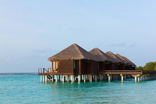 istock Water Villas at Sunset. Welcome to Paradise! 105769970