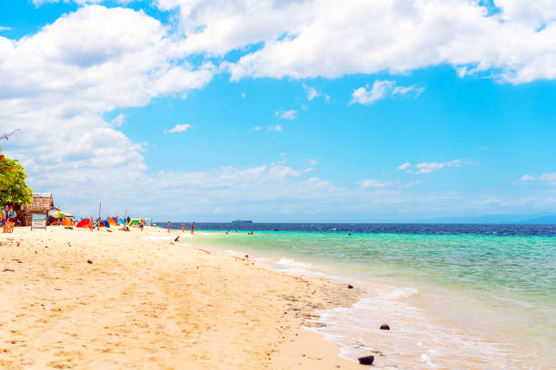 istock View of the sandy beach in Moalboal, Cebu, Philippines. Copy space for text. 1057704486