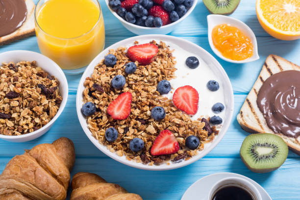 istock Granola yogurt and berries 1057706486