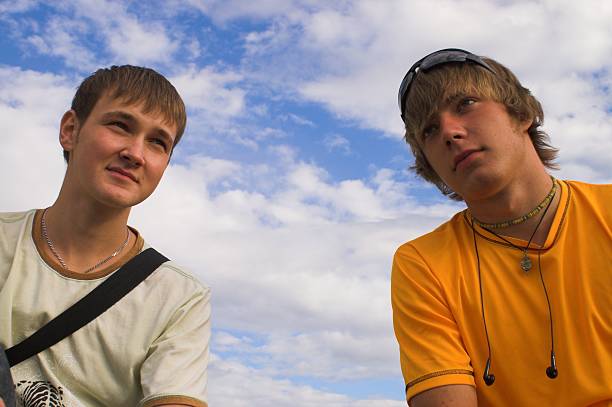 istock Two boys in the face of sky 105770678