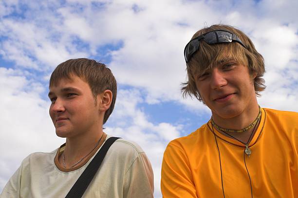 istock Two boys in the face of sky 105770690