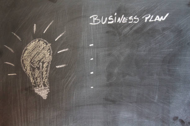 istock Drawing lamp on blackboard. Idea and Creativity Concept 1057708862