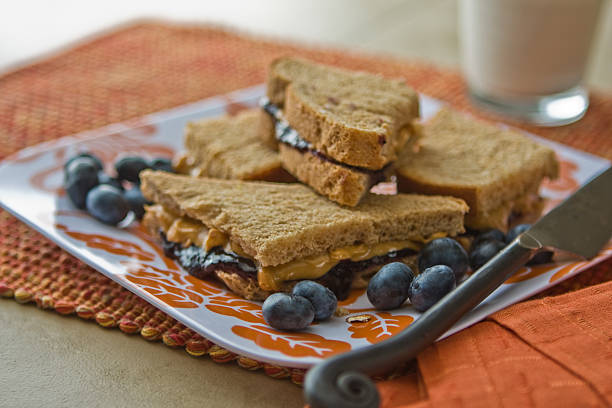 istock Blueberry Jam and Peanut Butter Sandwich 105772036