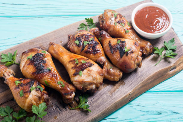istock Grilled chicken legs with tomato sauce 1057724504