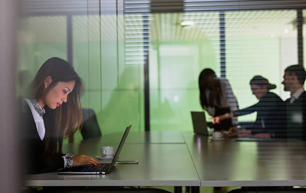 istock Business coworkers  working late  in office 1057727304