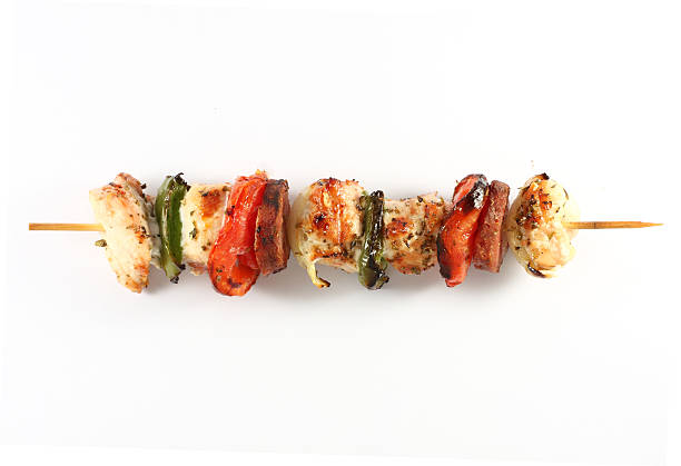 pic de brochette avec des chiche-kebab: - close up roasted meal pepper photos et images de collection