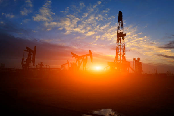 istock Oil Pump on orange sunset 1057734148