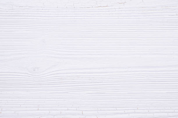 istock White wood texture with natural striped pattern for background, wooden surface for add text or design. 1057734860