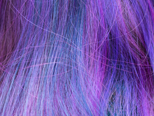 istock blue and violed colored female hairs 1057739382