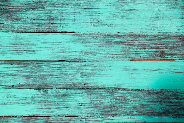 istock Blue color, grunge old scratched wood board textured background 1057744758