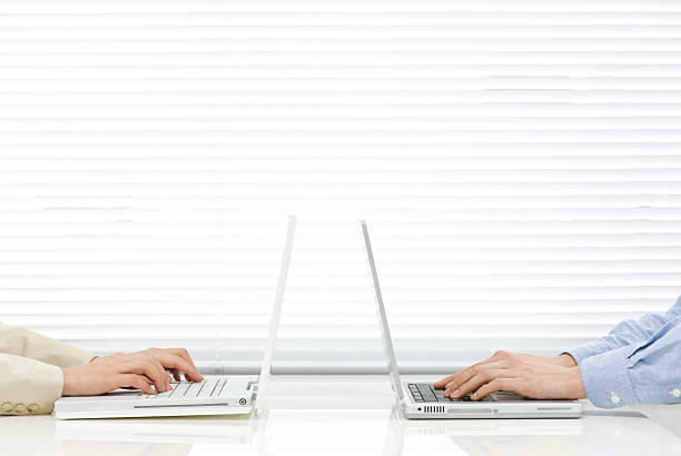 istock Man and woman who uses laptop computer 105775135