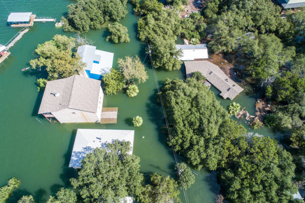 istock Homes under water after natural disaster declared for Texas after major flooding event 1057751690
