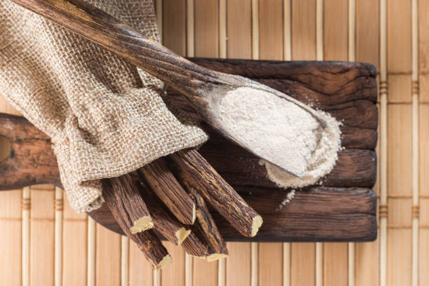 istock Powder and licorice root on the table - Glycyrrhiza glabra. 1057753600