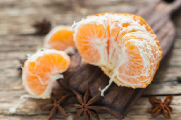 istock tangerine fruit without peel, on the table. 1057758206