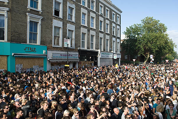 Crowds at Notting Hill Carnival, London  notting hill stock pictures, royalty-free photos & images