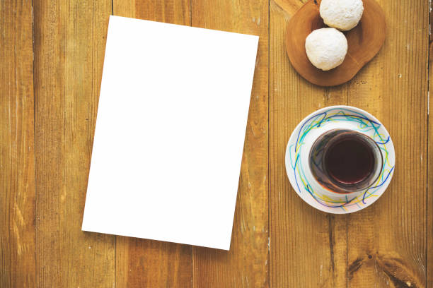 White blank magazine with tea and cookies