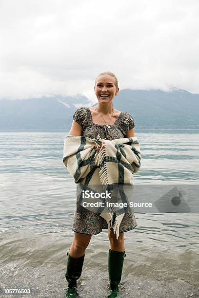 Mid Adult Woman Standing In Lake Stock Photo - Download Image Now - 30-34 Years, Adult, Adults Only