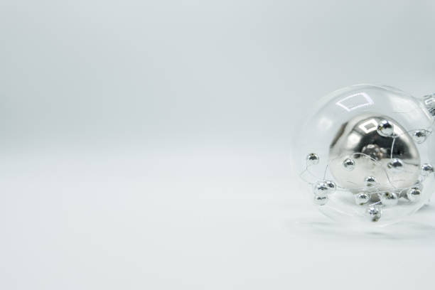 istock Transparent christmas ball with silver spheres and silver bauble. 1057768392