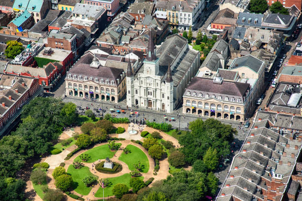 St. Louis Cathedral and Jackson Square From Above The St. Louis Cathedral at the foot of Jackson Square in the French Quarter of New Orleans, Louisiana. jackson square stock pictures, royalty-free photos & images