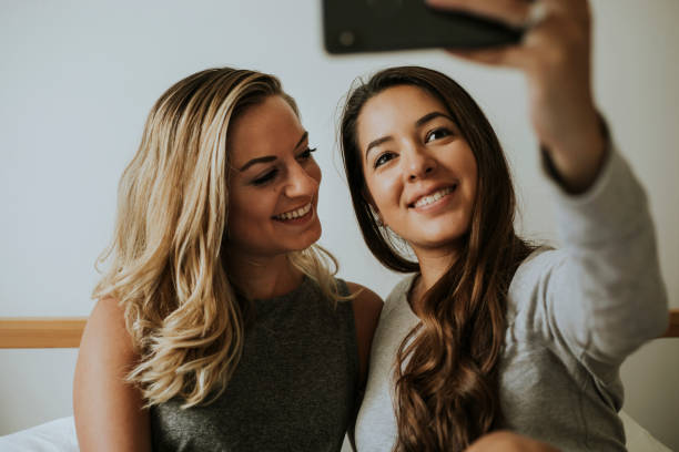istock Lesbian couple taking a selfie 1057772732